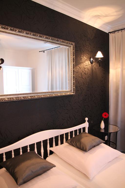 Libra Apartment Mikolajki Bagian luar foto