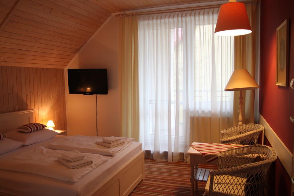 Libra Apartment Mikolajki Bagian luar foto
